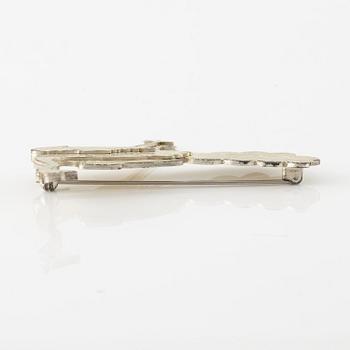 Wiwen Nilsson, a brooch, sterling silver, in the form of a peacock, Lund 1959.