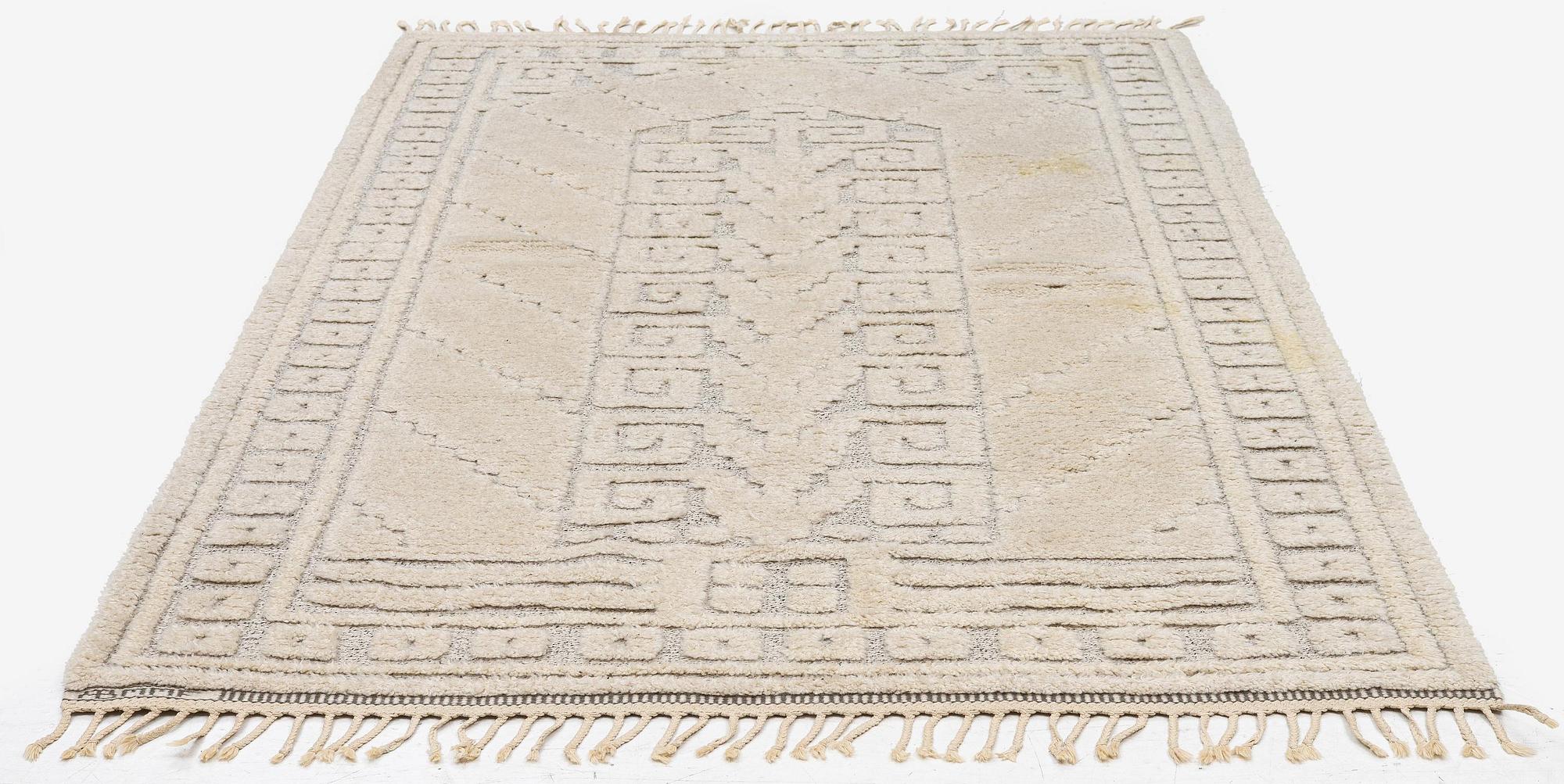 Märta Måås-Fjetterström, a 'Vita spetsporten' carpet, knotted pile in relief,  c. 218 x 119 cm, signed AB MMF,