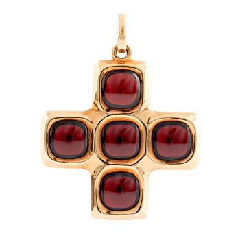 513. An 18K gold and garnet Pomellato cross.