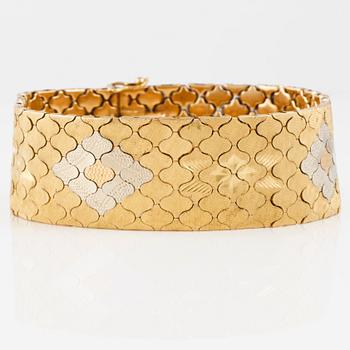 ARMBAND, 18K tvåfärgat guld, utländska stämplar. Vikt 52,9 gram.