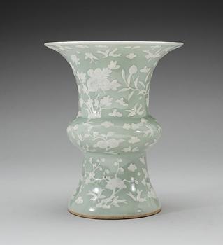 A celadon slip decorated vase, Qing dynasty, Kangxi (1662-1722).