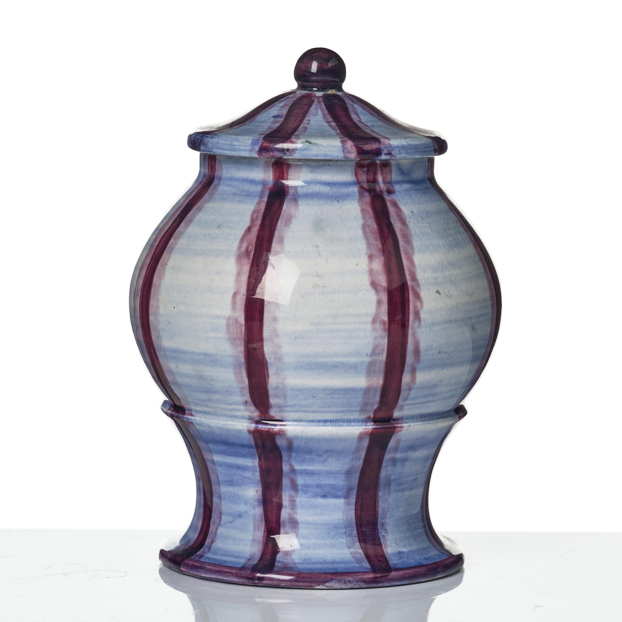 Wilhelm Kåge, a jar with cover, and four vases, creamware and porcelain, Gustavsberg, Sweden, 1917-1920.