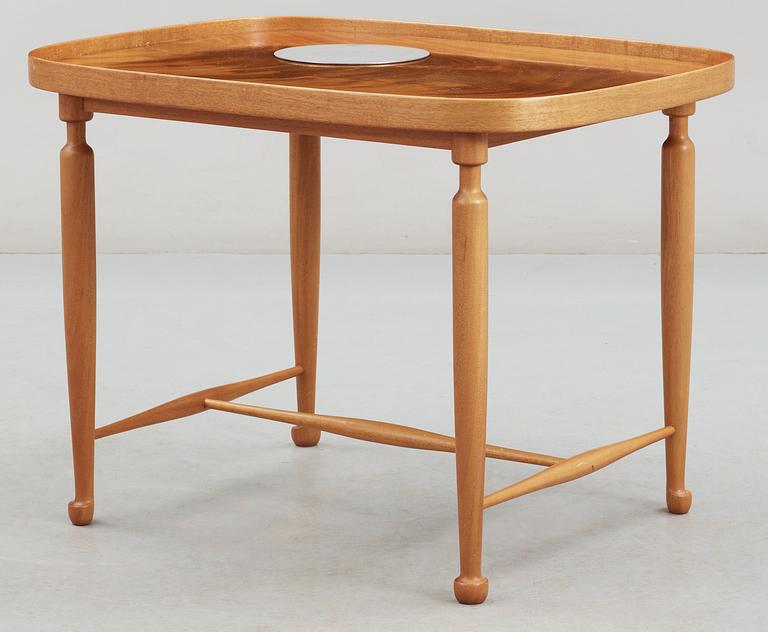 A Josef Frank oval mahogany table,