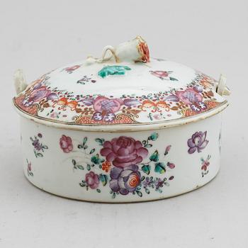 A famille rose butter tureen with cover and two cups with three odd stands, Qing dynasty, Qianlong (1736-95).
