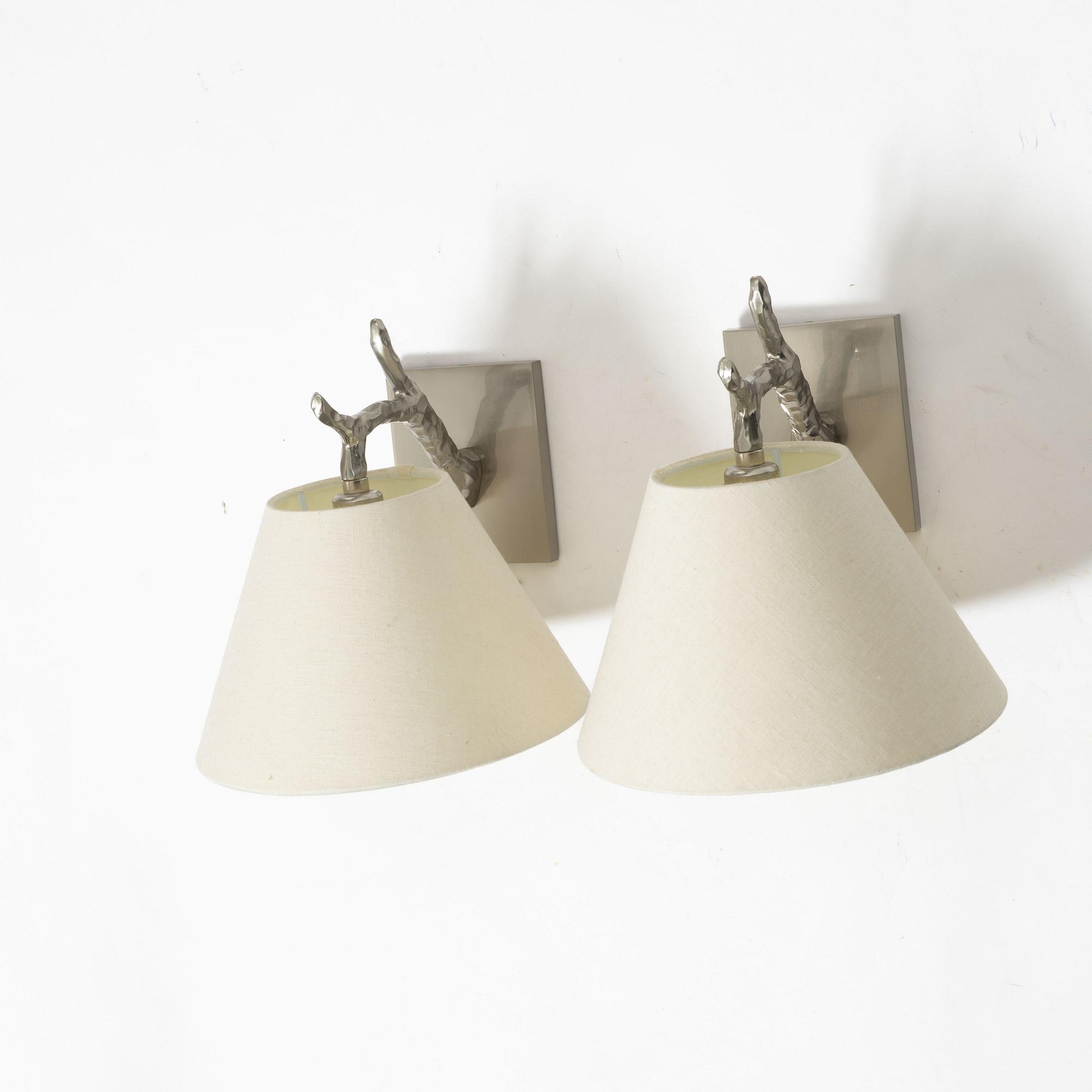 A pair of 'Twig Down' wall lamps, Vaughan, United Kingdom.