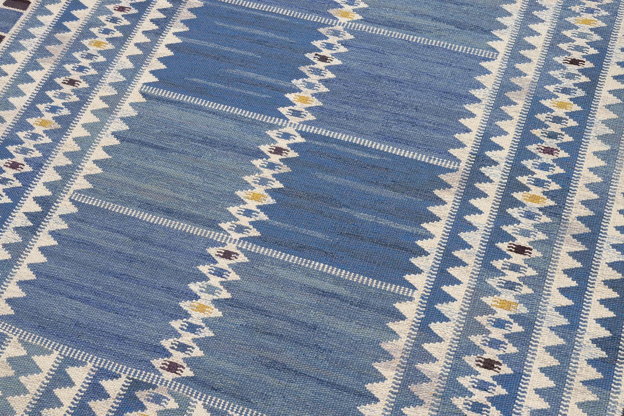 Barbro Nilsson, a carpet, 'Salerno blå', flat weave, c. 245 x 182 cm, signed AB MMF BN.