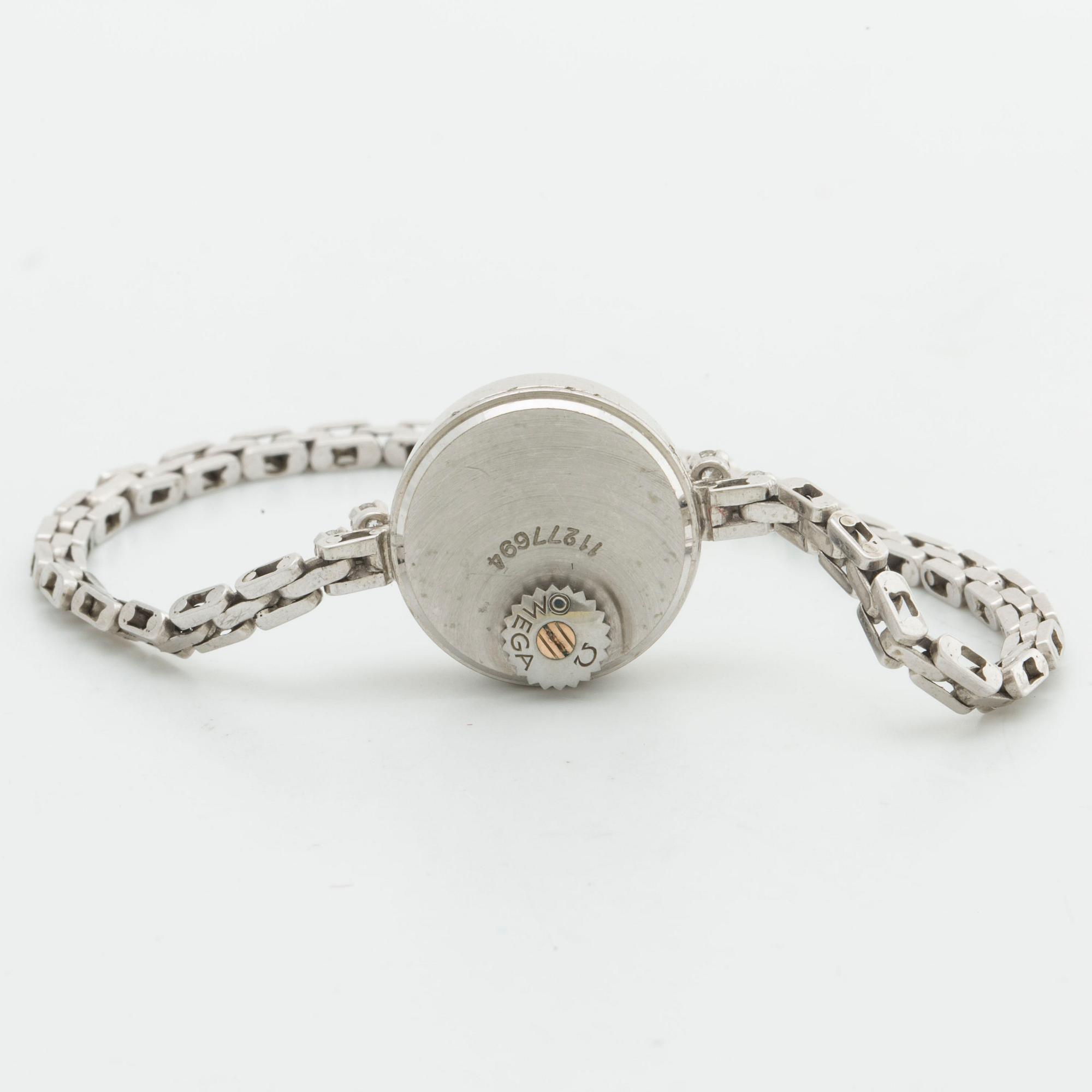 OMEGA ladies wristwatch, 15 mm, 18K whitegold, brilliant-cut diamonds approx 0,40 ct in total.