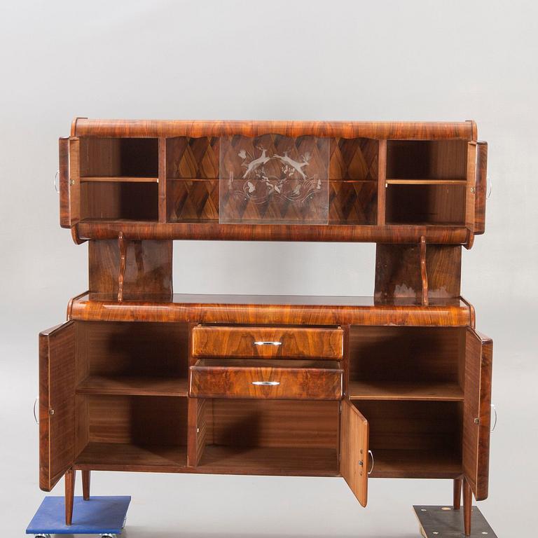 An Italian 1950s walnut sideboard.