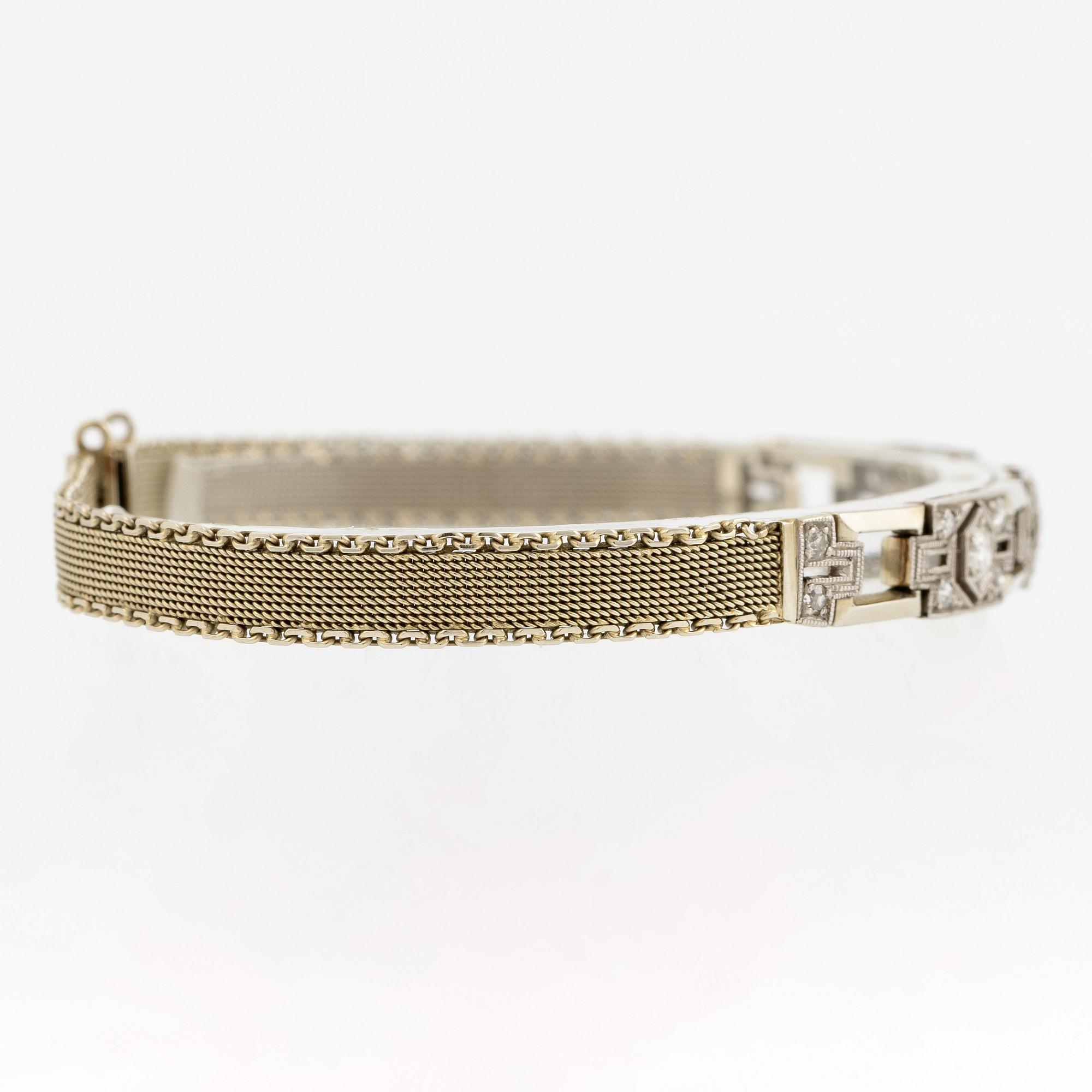 Arm bracelet, 18K white gold with brilliant-cut diamonds, old cut and octagonal-cut diamonds.