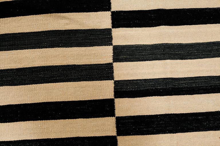 A Kelim carpet, ca 280 x 240 cm.