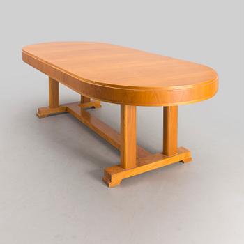 A mid 20th century dining table.