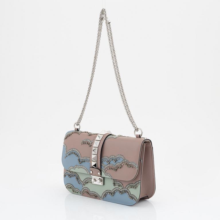 Valentino Garavani, A tinted leather and rhinestone bag.