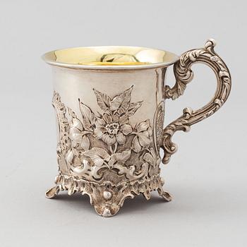 A parcel-gilt Rococo Revival silver jug, mark of Charles Fox II, London 1839.