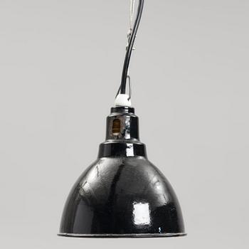 An early 20th century industrial lamp.