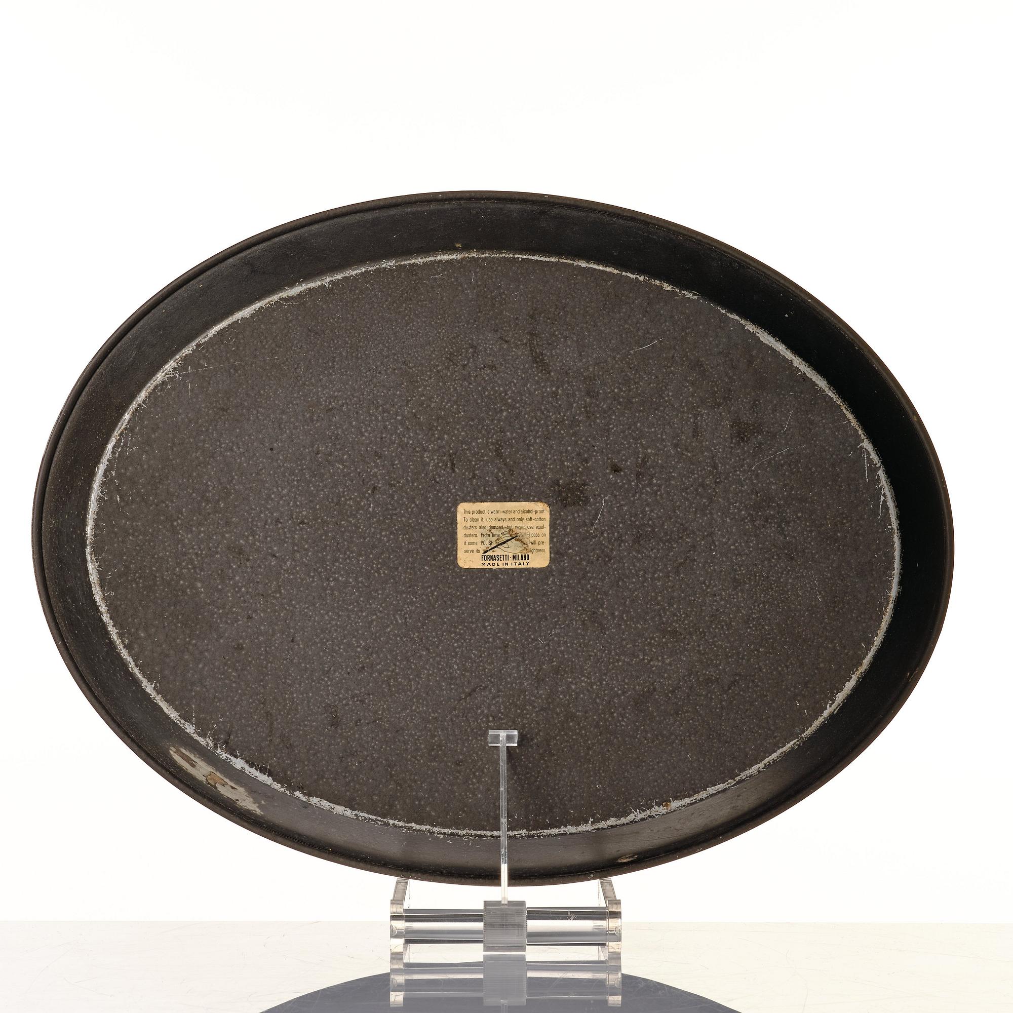 Piero Fornasetti, an oval printed and lacquered sheet metal tray, Milan, Italy probably 1960's.