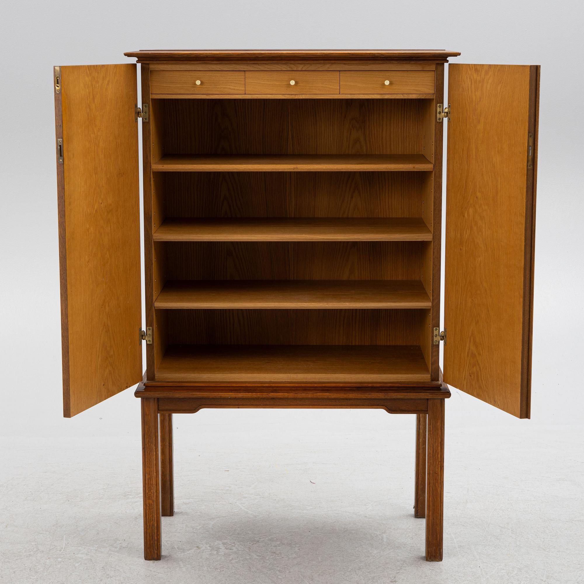 Oscar Nilsson, attributed to, a Swedish Modern oak cabinet, likely executed by Åfors Möbelfabrik, 1940s.