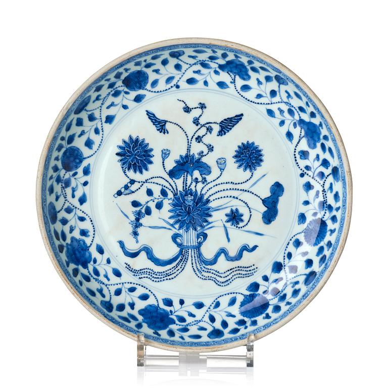 A blue and white ming-style 'lotus bouquet' dish, Qing dynasty, 18th century.