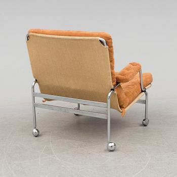 BRUNO MATHSSON, a 'Karin' tubular steel easy chair from Dux.