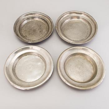 FOUR PEWTER PLATES, Sweden, amongst others Wexiö, 19th century.