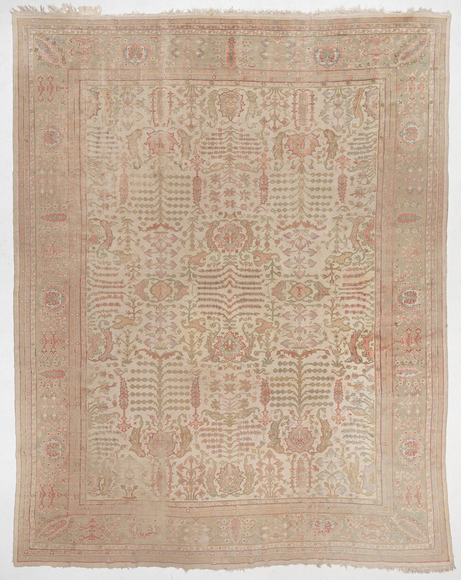 An antique Ushak carpet, West Anatolia, c. 486 x 391 cm.