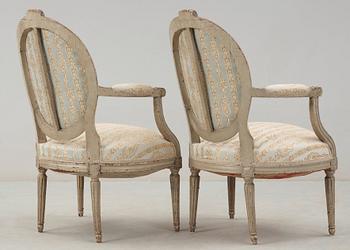 A pair of Louis XVI late 18th century armchairs.