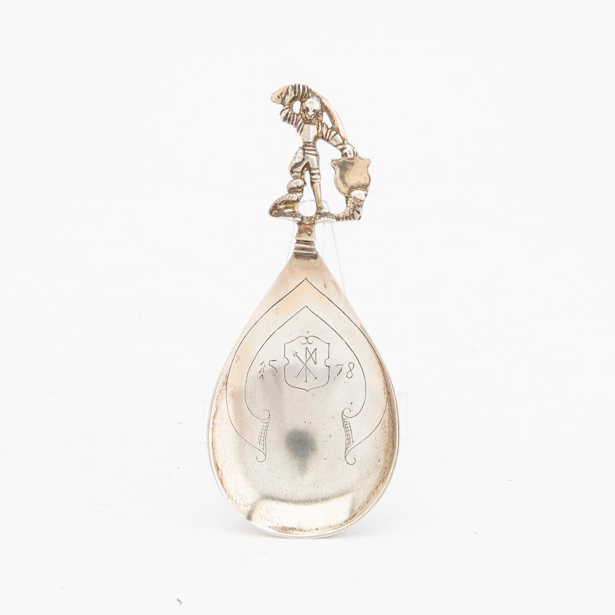 An English 20th century silver spoon stamed 1900.