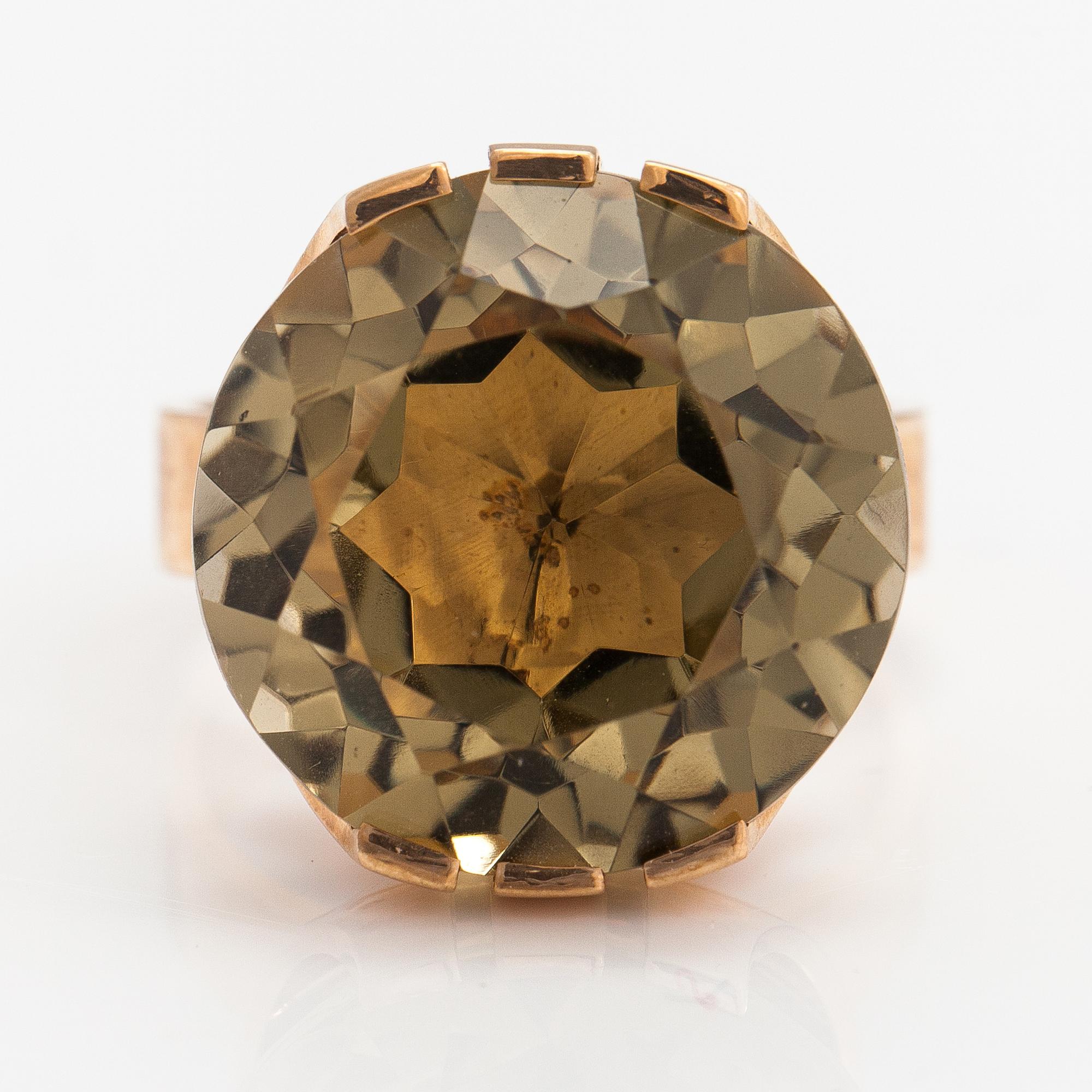 Elis Kauppi, A 14K gold ring with a smoky quartz. Kupittaan kulta,Turku.