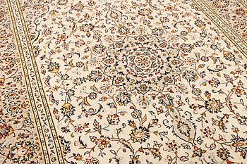 A Kashan carpet, c. 295 x 197 cm .