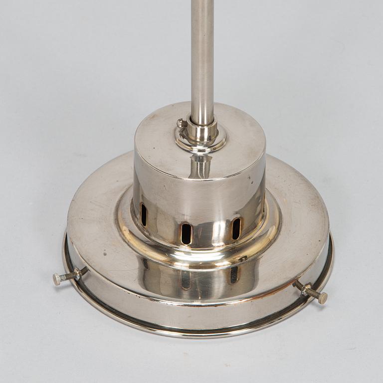 Paavo Tynell, kattovalaisin, malli 2004, Taito 1930-luku.