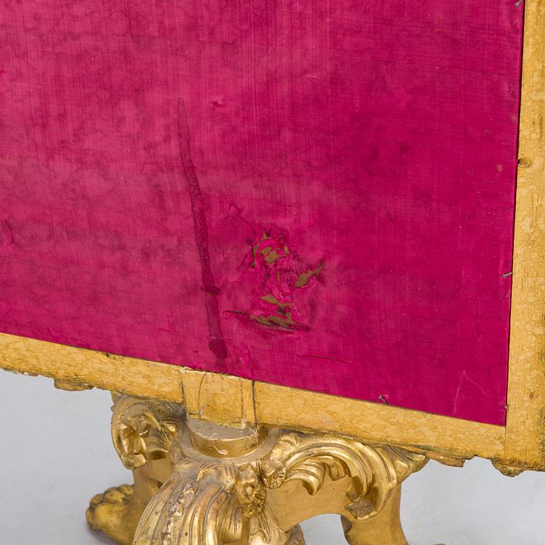 A Baroque style/Rococo revival brass protection, late 19th century.