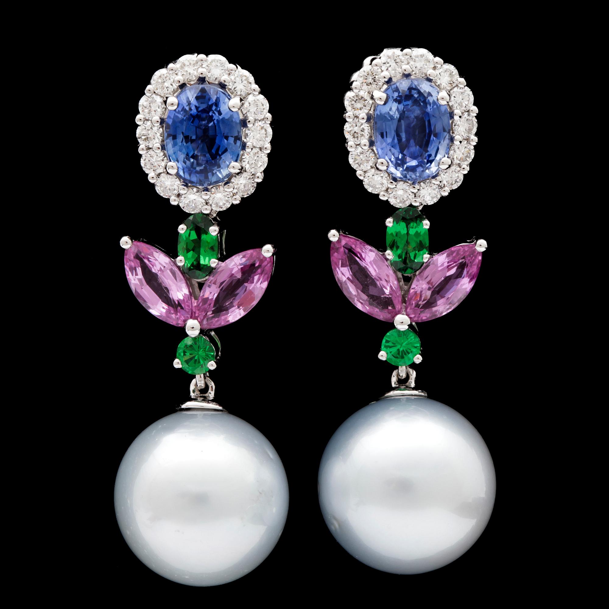 A pair of sapphire, tsavorite and cultured South sea pearl earrings.