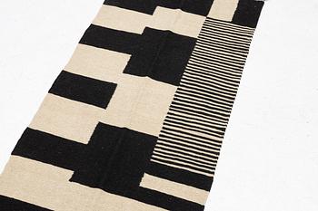 A Kelim runner carpet, 300 x 93 cm.