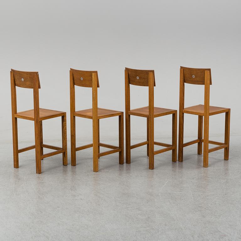 MARIO PRANDINA, an oak table and four chairs, Plinio Il Giovane, Italy.