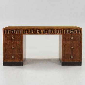 A Carl Malmsten palisander desk, Åtvidaberg, Sweden circa 1934.