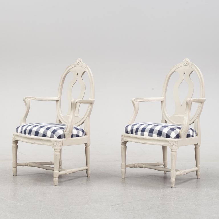 A pair of gustavian armchairs made in Stockholm, the later part of the 18th century.