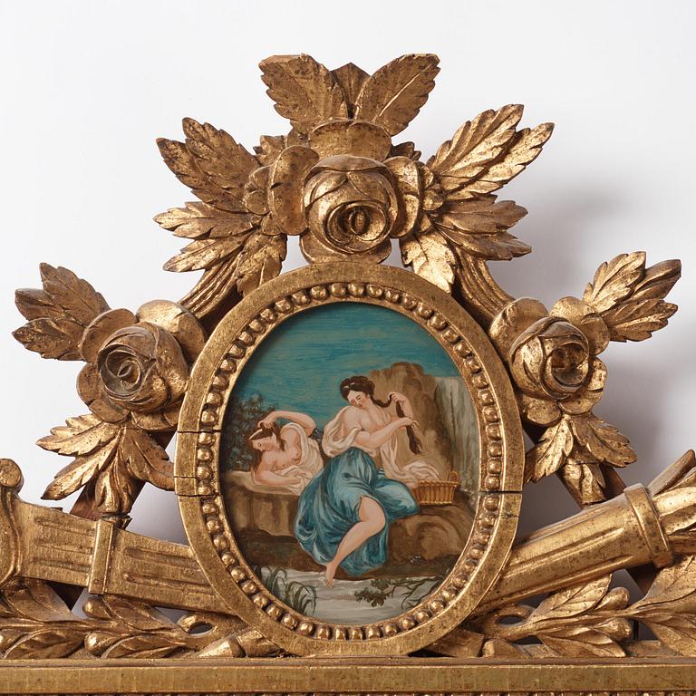 A late-Gustavian carved giltwood mirror by C. Corssar (master in Stockholm 1791-1808).