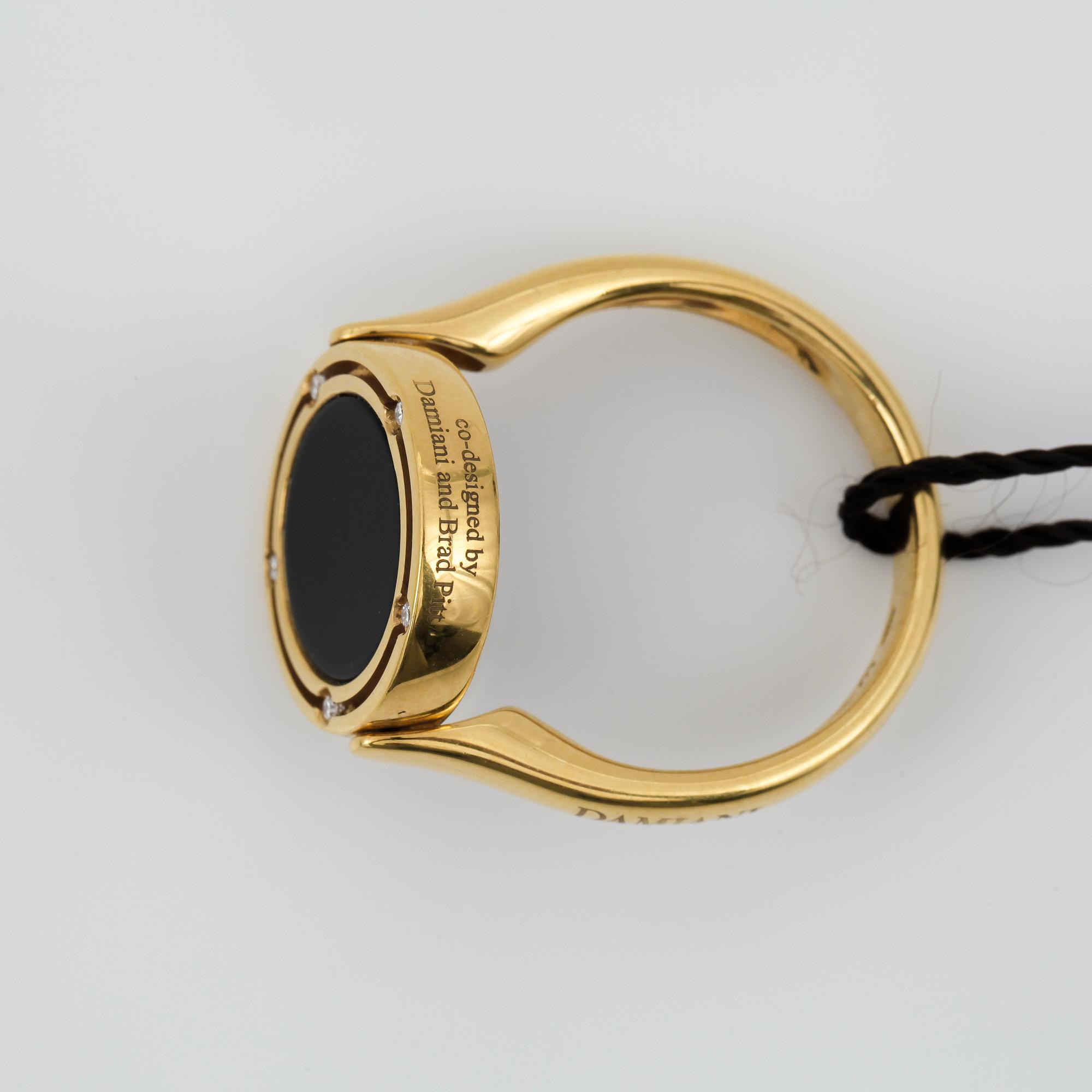 RING, Damiani och Brad Pitt design, Italy. Reversible with Lapis Lazuli, Onys and 10 small diamonds.