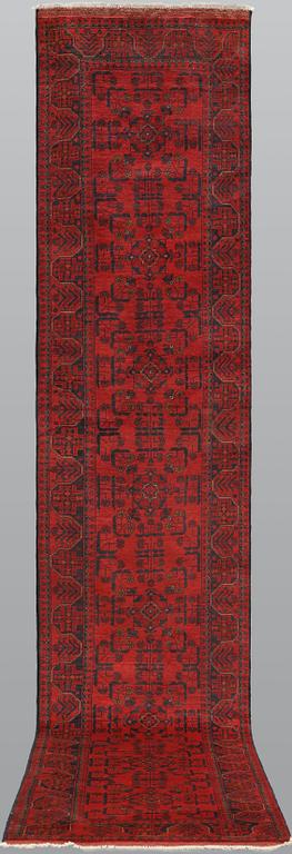 A runner, Afghan, c. 392 x 79 cm.