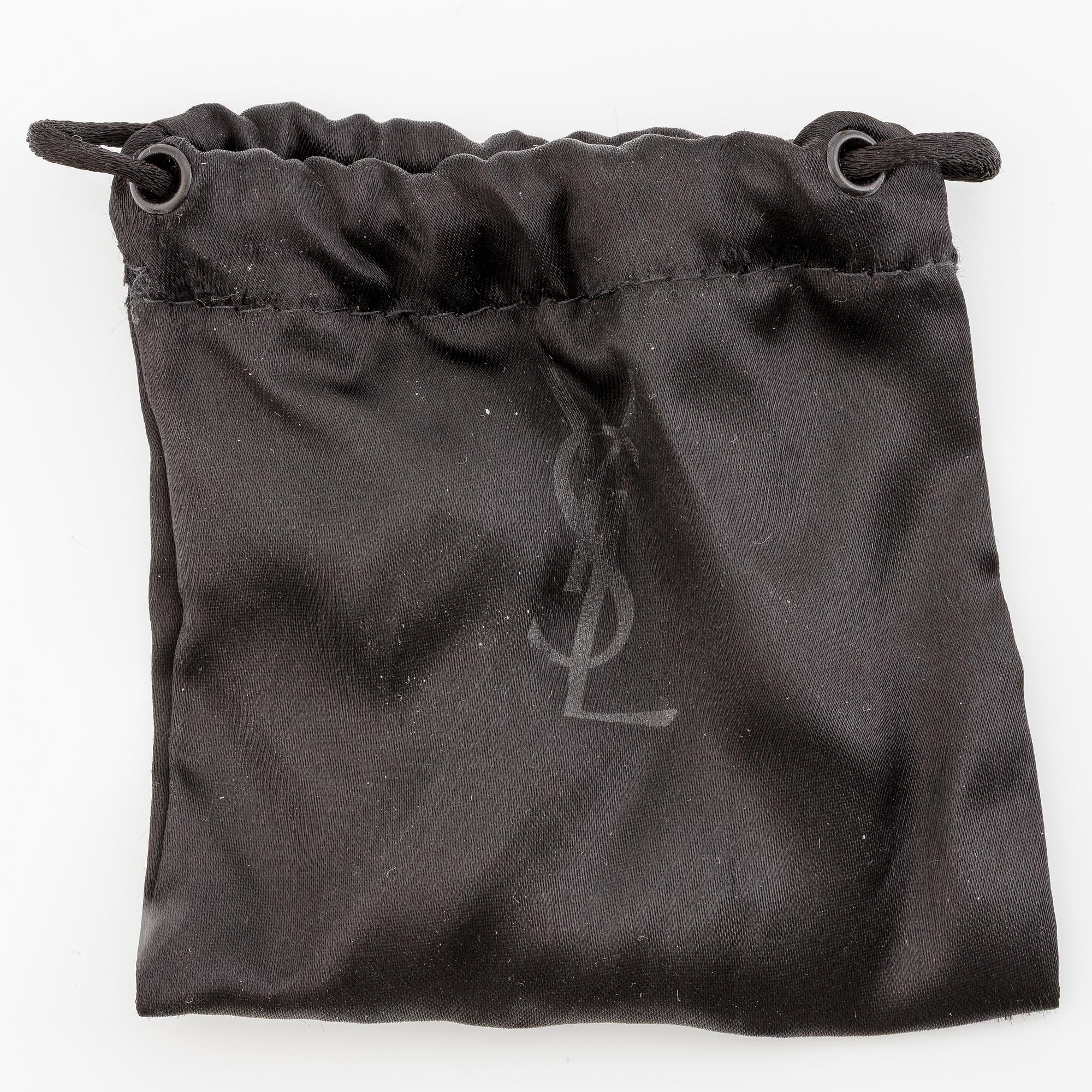 Yves Saint Laurent, ring.