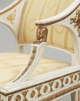 A pair of late Gustavian early 19th century armchairs.