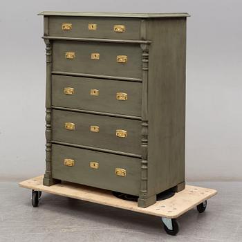 A painted chest of drawers, circa 1900.