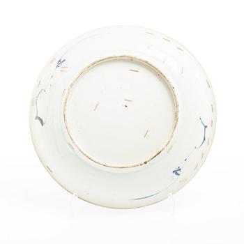 A group of three large Chinese blue and white porcelain dishes, Qing dynasty, Kangxi (1662-1722).