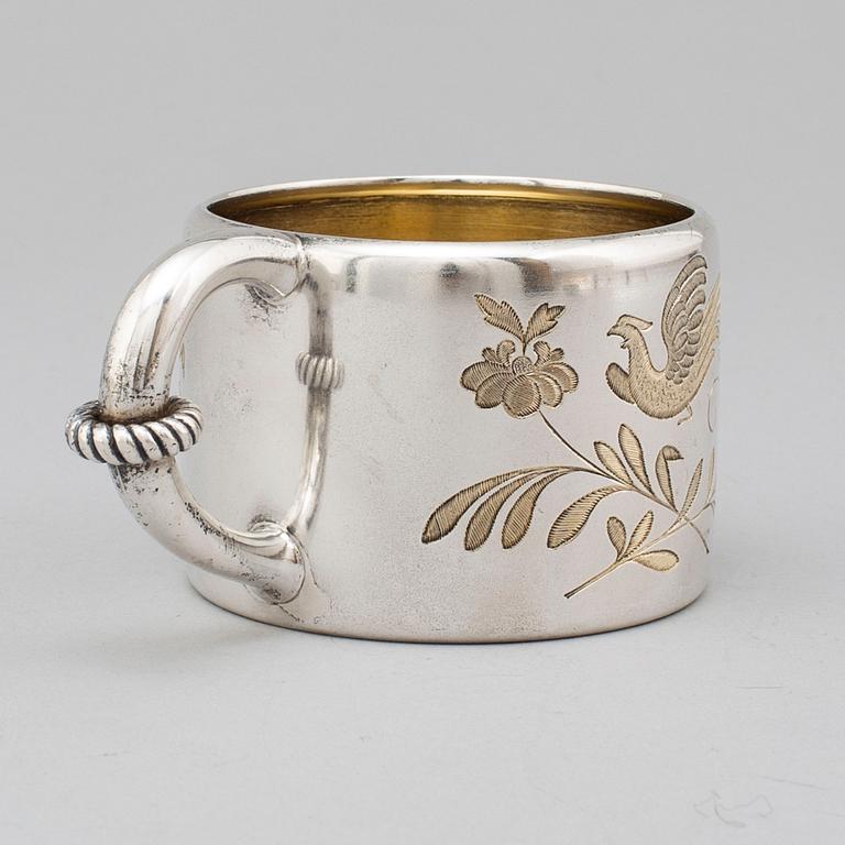 A Russian 19th century parcel-gilt silver mugg, mark of Mikhail Gratchev, St. Petersburg 1895. Imperial Warrant.