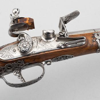 Flintlock pistol, signed Ivan Garatto. Brescia 17th century.