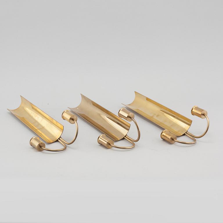 Three wall candle holders from Skultuna, model "Reflex", second half of the 20th century.