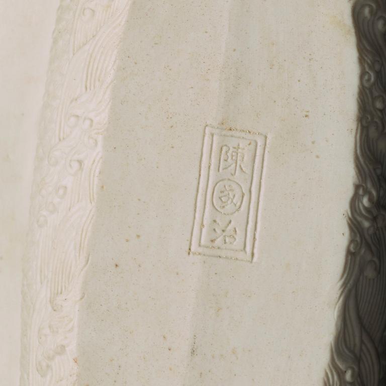 A biscuit porcelain dragon boat of 'Assembly of Immortals', Qing dynasty, Daoguang, signed Chen Guozhi, 19th century.