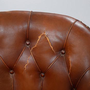 Early 20th century armchairs.