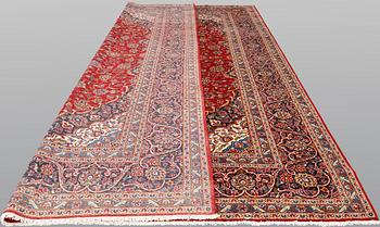 A Keshan carpet, 398 x 298 cm.