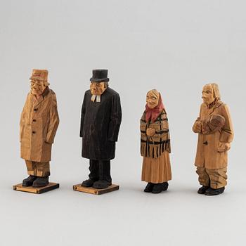 Four Carl Johan Trygg wooden sculptures, two signed and dated 1918.