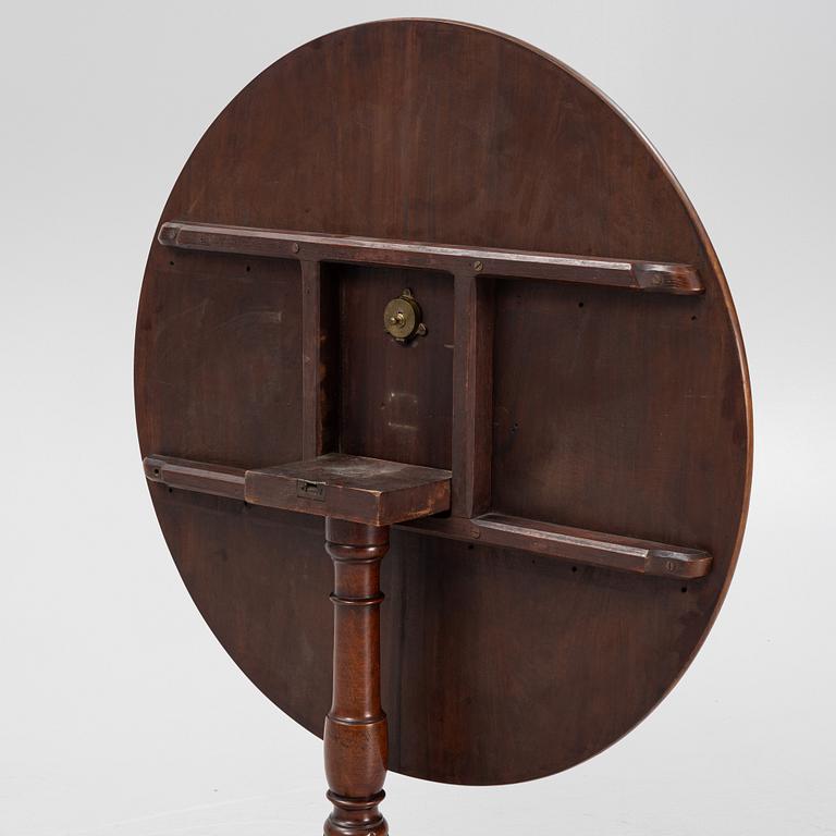 An English mahogany table, second half of the 19th Century.